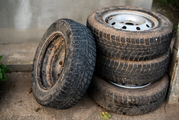 Obraz premium Three Used Tires Stacked on Each Other