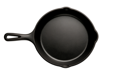 Black cast iron skillet on a white isolate background. transparent background