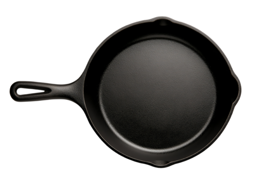 Black cast iron skillet on a white isolate background. transparent background