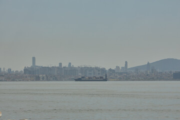 Istanbul skyline with cargo ship in april 2024