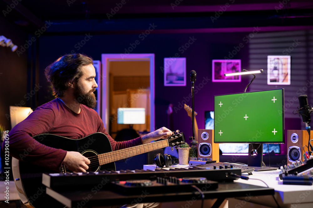 Aufkleber Beginner composer trying to tune his guitar strings for a new song, watching online videos on greenscreen pc layout. Artist twisting the knobs on his acoustic instrument, learning to play.