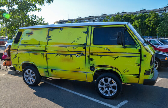 1986 Volkswagen Transporter T3 - Iconic van with a boxy design, rear-engine layout, and versatile interior. Features include a 1.9L water-cooled engine and optional 4WD