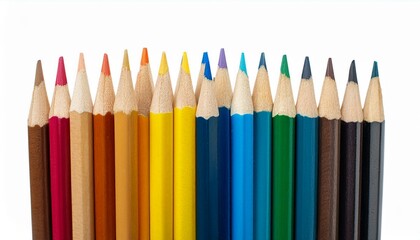 Crayons, small colored pencil collection loosely arranged, isolated white background. 