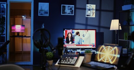 Zoom out shot of audio equipment used for podcasts, vlogging and livestreams on vlog channel. Professional microphone, analog mixer and headphones in studio used for recording sounds