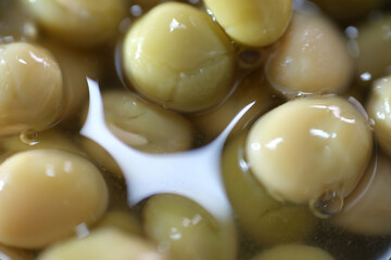 Macro shot of processed peas in the can