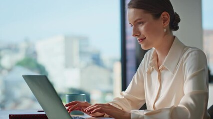 Confident woman typing laptop at home office closeup. Professional manager