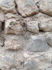 A view of a rusty stone wall
