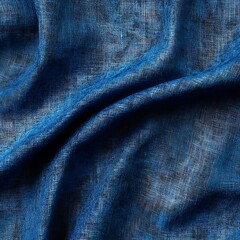 A close-up of textured blue fabric, showcasing its intricate weave and depth.