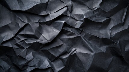 Obraz premium Textured black paper background featuring a slightly rough feel, perfect for creative projects and graphic design applications
