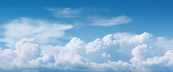 Fototapeta premium Blue sky background with white clouds. Cumulus white clouds in the blue sky.