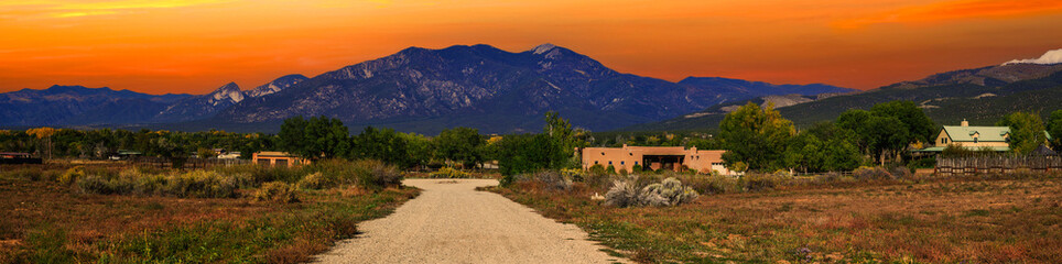 Taos New Mexico Autumn Landscape with Glowing Orange Sky over the Sangre de Cristo Mountains: A...