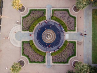 Tourists relaxing around the Pineapple Fountain, Charleston, South Carolina, United States.