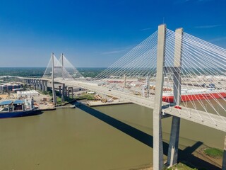 Fototapeta premium Traffic on the Talmadge Memorial Bridge that crosses the Savannah River, Savannah, Georgia, United States.