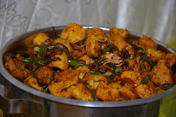A vibrant and hearty plate of traditional Sri Lankan rice and curry, showcasing a variety of colorful vegetables, spiced curries, and fragrant rice. A perfect representation of Sri Lankan cuisine