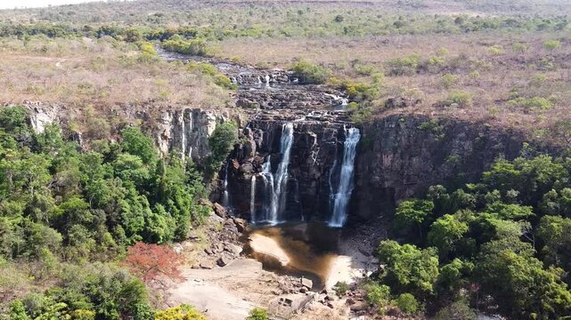 Salto Corumb&aacute; waterfall with crystal clear waters in the middle of the forest in the Brazilian cerrado, Brazil