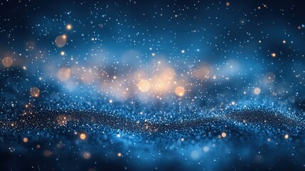 Obraz premium Abstract blue and gold bokeh background with sparkling particles.