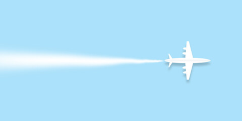 White passenger airplane flying and white smoke on light blue sky