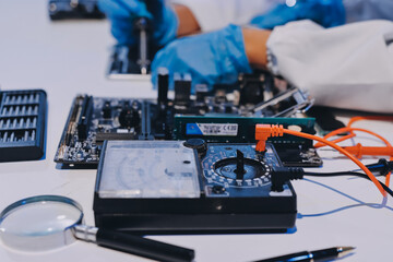 Electronics technician, electronic engineering electronic repair, electronics measuring and testing, repair and maintenance concepts.