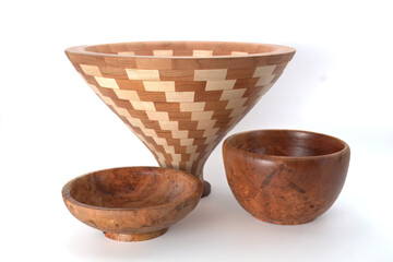 Three hand lathe turned bowls.  The bowls are made from hardwoods and represent artisan quality woodworking. 