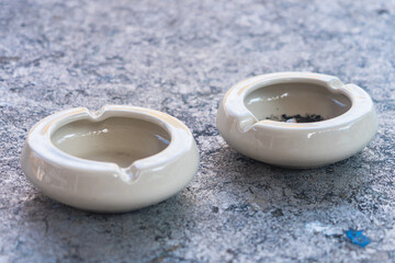 Ashes and Silence: Cigarette in Ashtray