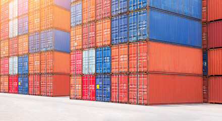 Obraz premium Stacked of Multicolored Containers Shipping. Handling of Logistics Transportation Industry. Freight Trucks Import-Export. Distribution Warehouse Port. Shipping Logistics Transport Ships.