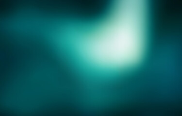 Obraz premium An abstract design with blurred lines and a gradient of blue, teal, and white.