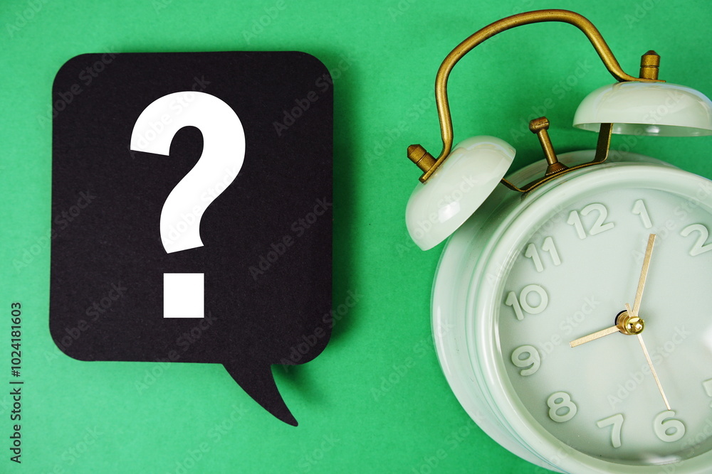 Poster question mark text on speech bubble with alarm clock on green background