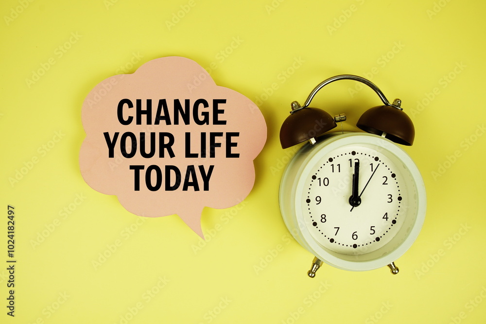 Poster change your life today text on speech bubble with alarm clock on yellow background