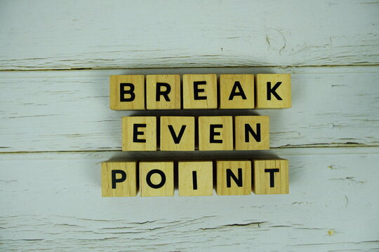 with wooden blocks alphabet letters on wooden background