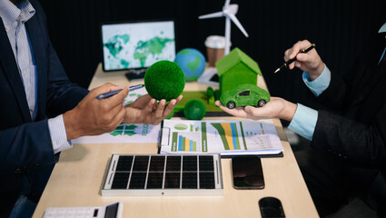 business team people planning and discussing on recycle reduce reuse policy symbol in office...