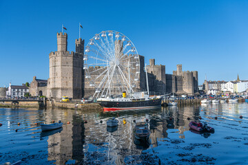 Caernarfon Castle, Gwynedd, Wales, UK - Caernarfon Castle in North West Wales on then banks of Afon Seiont. Built in 1330 it is now a Unesco World Heritage site.