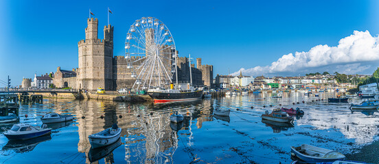 Caernarfon Castle, Gwynedd, Wales, UK - Caernarfon Castle in North West Wales on then banks of Afon Seiont. Built in 1330 it is now a Unesco World Heritage site.