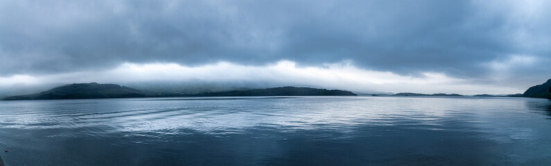 Obraz premium Panoramic view over Loch in Scotland, Evening panoramic view Scottish Highlands