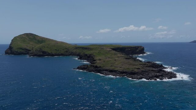 Panoramic aerial view over tropical Indian Ocean of Gunner's Quoin islet
