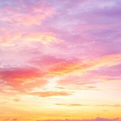 Obraz premium Vibrant Morning Sunrise with Colorful Sunset Sky Featuring Shades of Yellow, Orange, and Pink, Creating a Romantic and Sweet Golden Hour Horizon for Summer Backgrounds