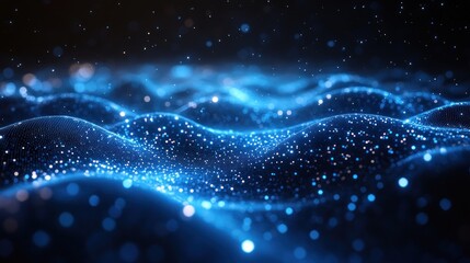 Abstract blue waves of particles glowing in the dark.