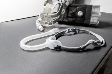 CPAP mask with nose mask or full face mask cpap machine against obstructive sleep apnea helps patients as respirator mask headgear clip for breathing medication in snoring sleep disorder breath easier