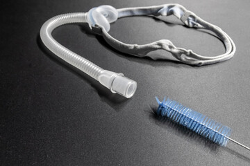 CPAP nose mask with cleaning brush for cpap machine against obstructive sleep apnea helps patients to clean respirator equipment tube headgear clip for breathing medication in snoring sleep disorder