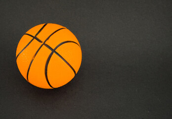 Basketball on a dark background.