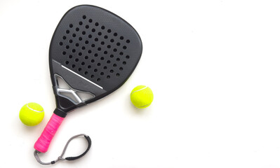 Background of black and white paddle tennis racket. Top view.