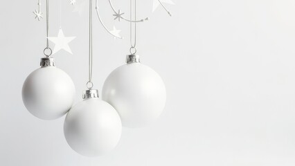White Christmas balls on a white background.