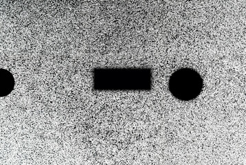 High-contrast black and white noise texture background, ideal for abstract design and graphic use.