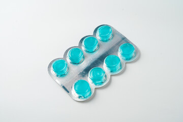 medical Lozenges tablets mint flavor in blister packaging on a white background