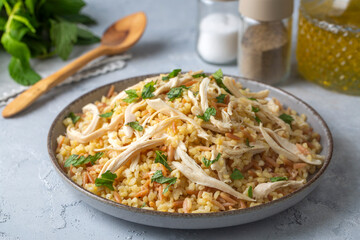Bulgur pilaf with chicken and noodles - Turkish name; sehriyeli tavuklu bilgur pilavi