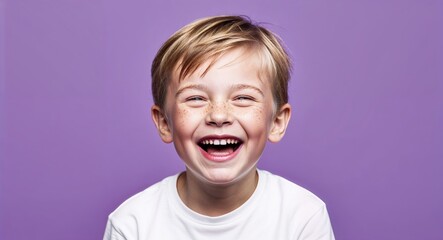 Kid white boy with freckles and short blonde hair surprised light green background