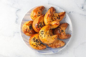 From Turkish cuisine; moon pastry is delicious - Turkish name; ay pogaca or ay coregi