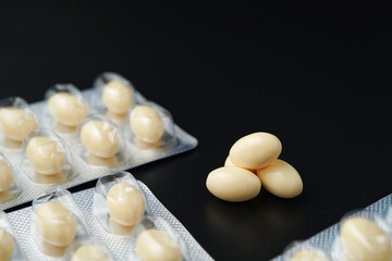 Vitamin in white soft gels capsules, Fish oil, omega 3, omega 9, vitamin D, vitamin E