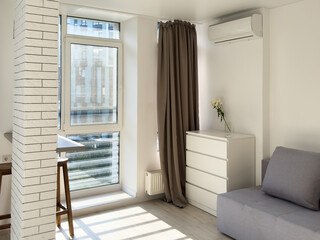 studio kitchen with sofa for rent