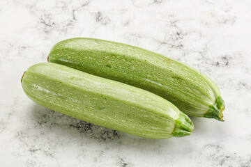 Raw green ripe zucchini vegetable