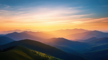 Obraz premium Breathtaking sunset over mountain range, glowing with warm orange and soft blue hues, creating serene and tranquil atmosphere